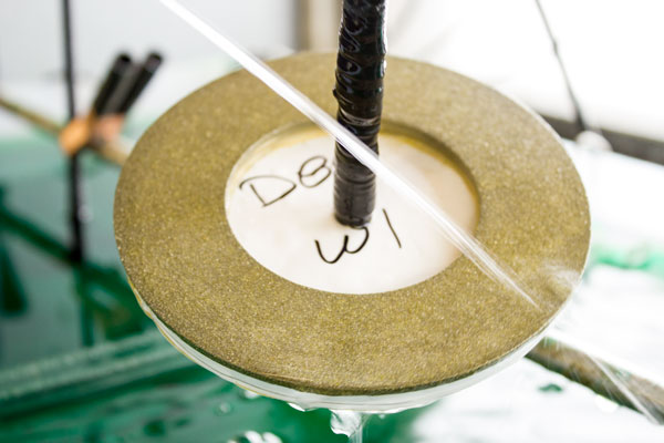 a wheel coming out of the tacking tank